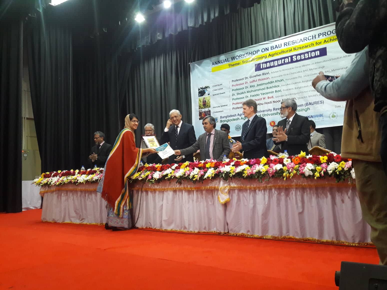 My wife is receiving the award (on behalf of me) from Vice-Chancellor, BAU